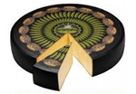 a wheel with a wedge of Fior Delle Alpi cheese