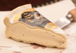 a wedge of Fromager d'Affinois with Truffles cheese
