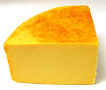 a wedge of Applewood Smoked Cheddar cheese