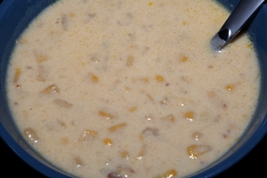 a blue bowl containing Bacon Corn Chowder Soup