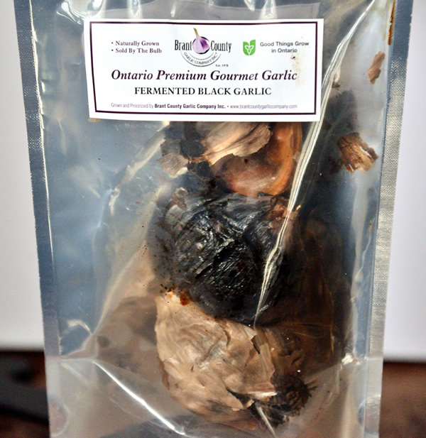 A package of Brant County black garlic bulb