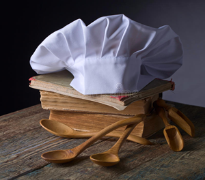 old-culinary-books-chef-hat-wooden-spoons