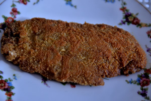 Plate containing a Chinese Marinated Breaded Chicken Cutlet