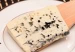 a slice of Gabriel Coulet Roquefort Castelviel cheese