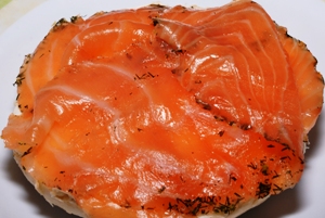 an open face bagel with Gravlax and cream cheese