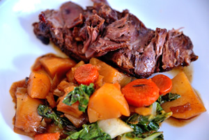 cooked Pot Roast with Potatoes Carrots and Bok Choy